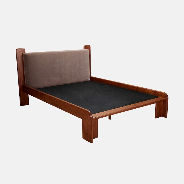 a wooden bed frame with a black mattress