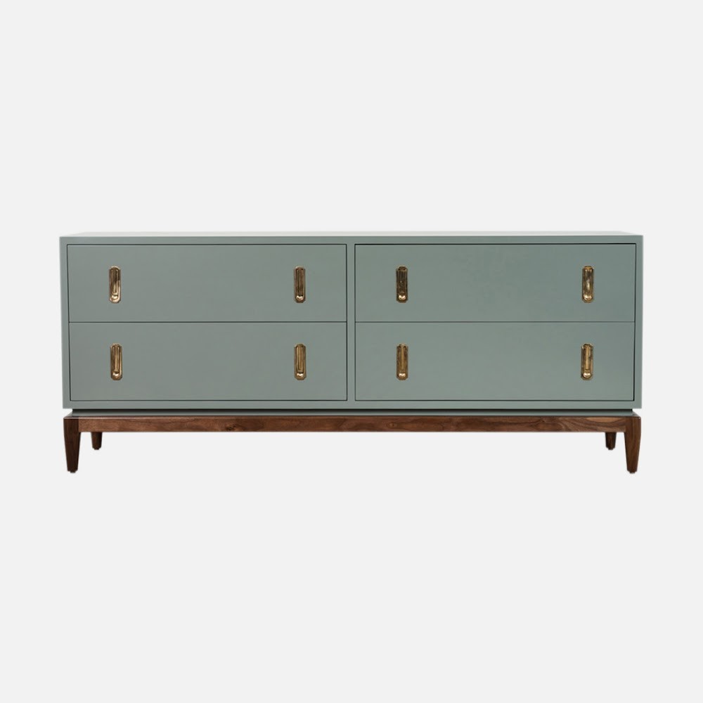 a grey dresser with brass handles and drawers
