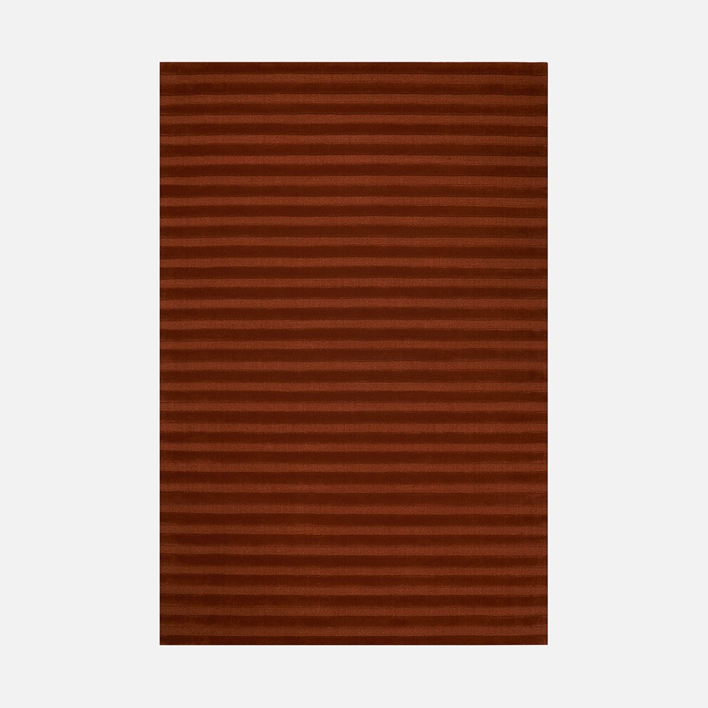 a brown area rug with horizontal stripes
