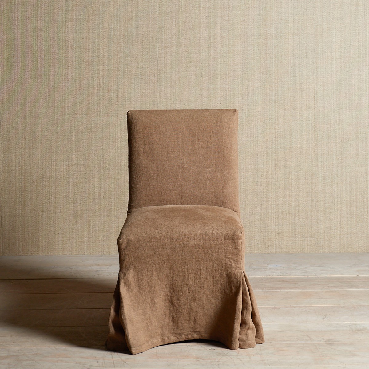 a chair with a brown cover on it