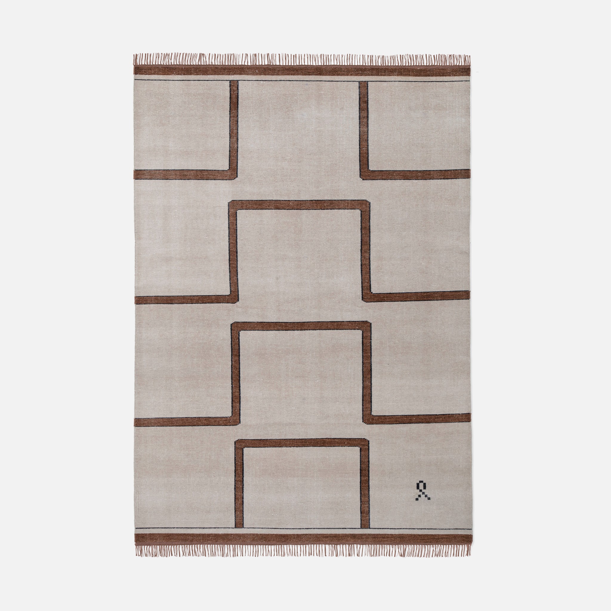 a beige and brown rug with squares on it