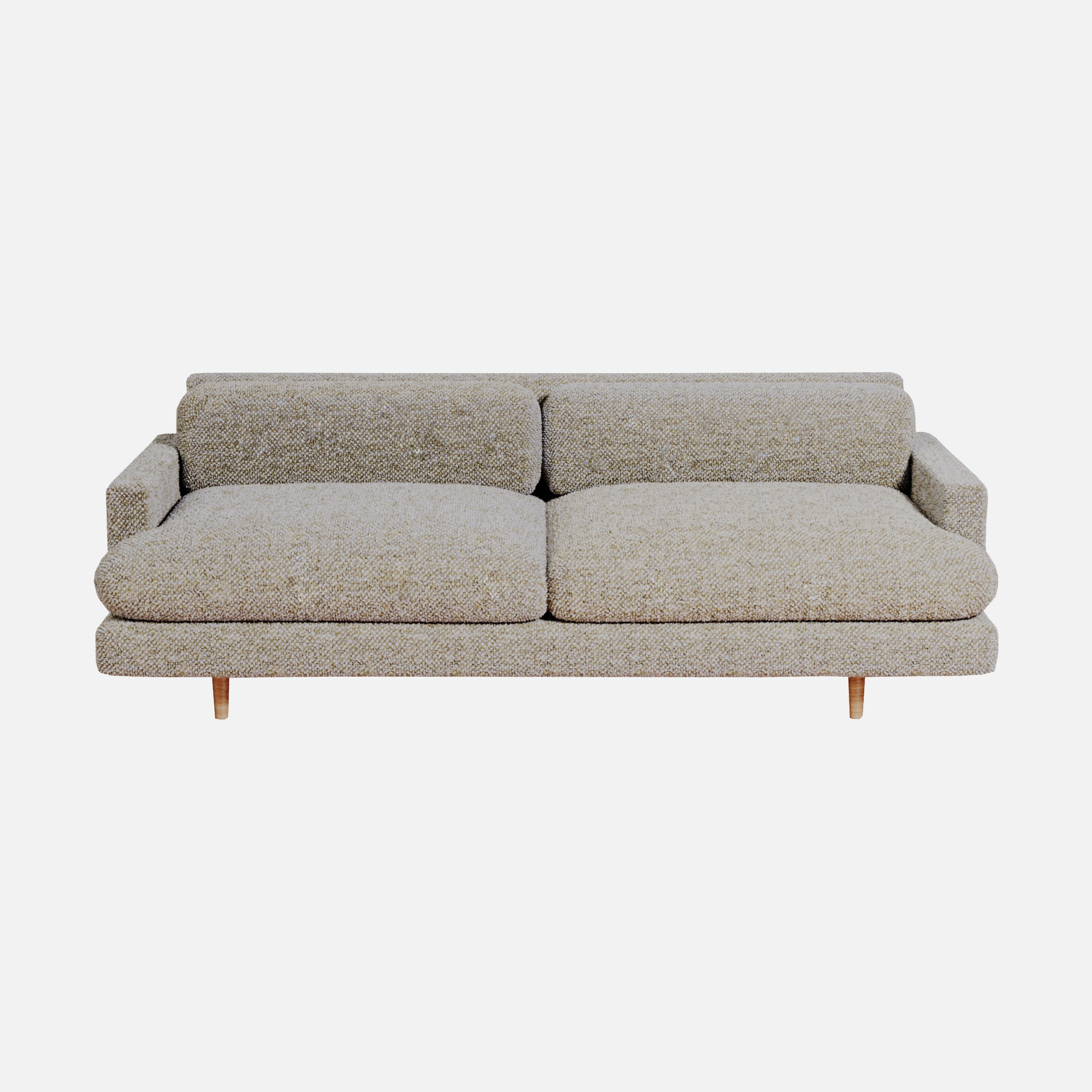 a beige couch with a wooden legs