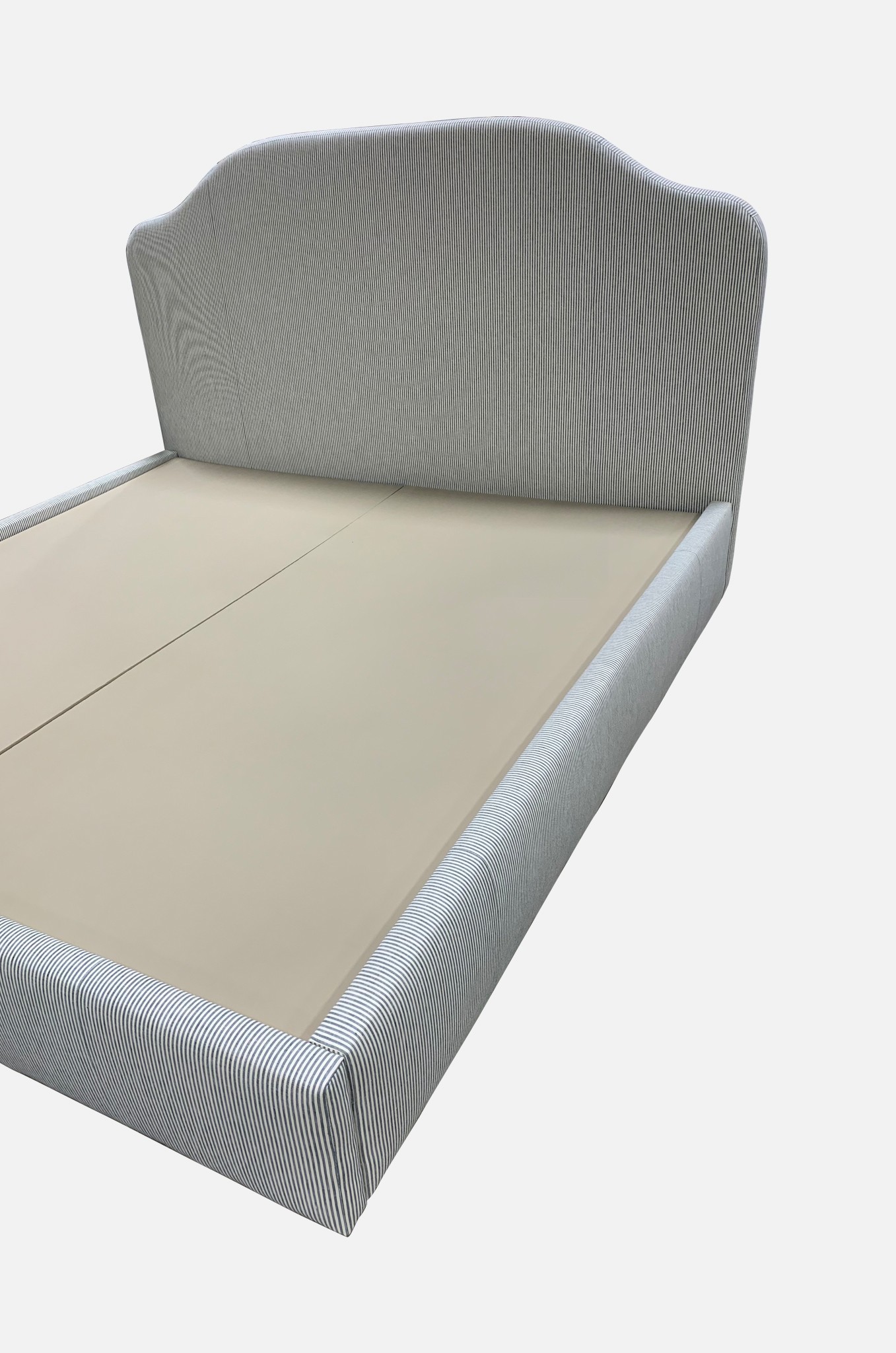 a bed frame with a mattress on top of it