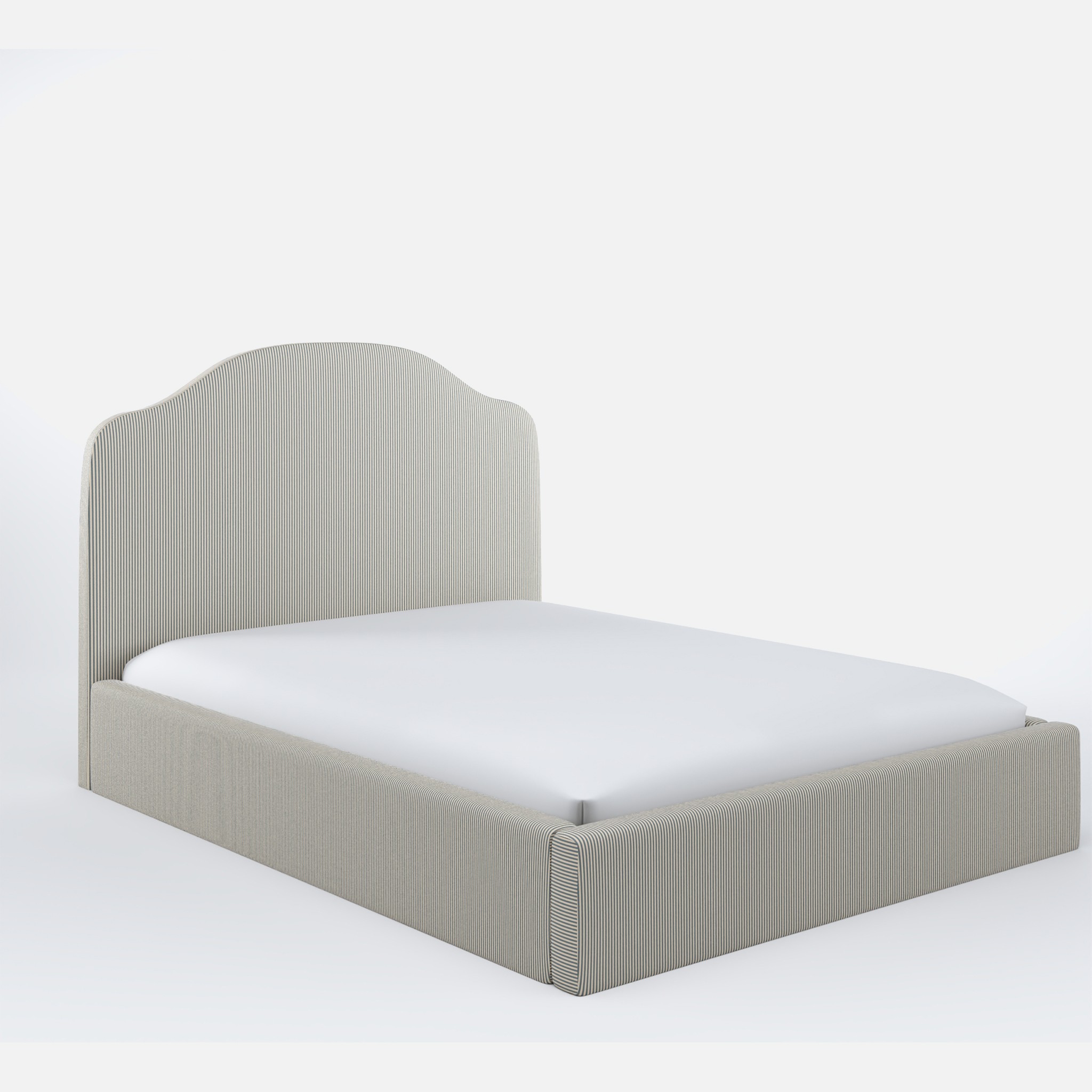 a bed that has a white sheet on it