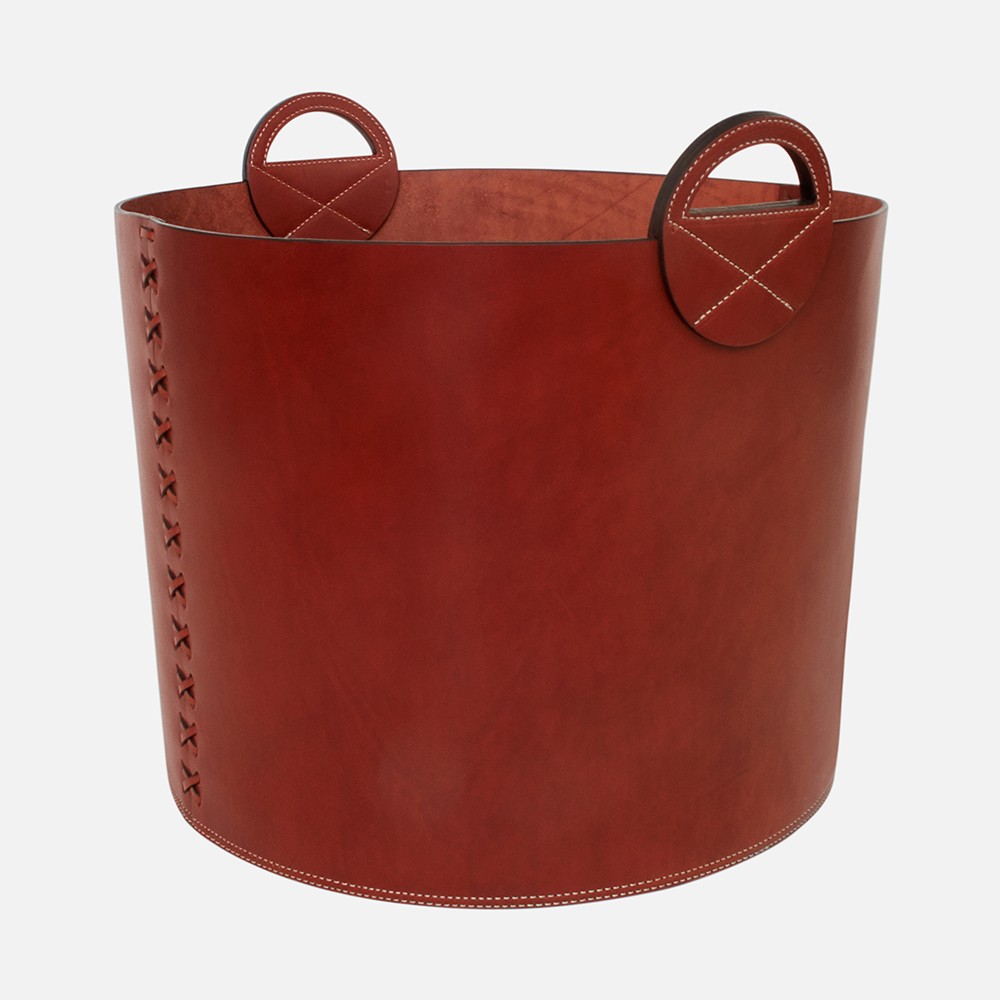 a brown leather bucket with two handles