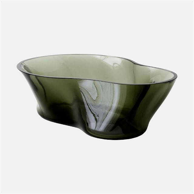 a glass bowl with a wavy design on it