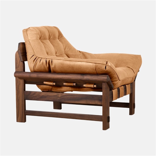 a wooden chair with a cushion on top of it