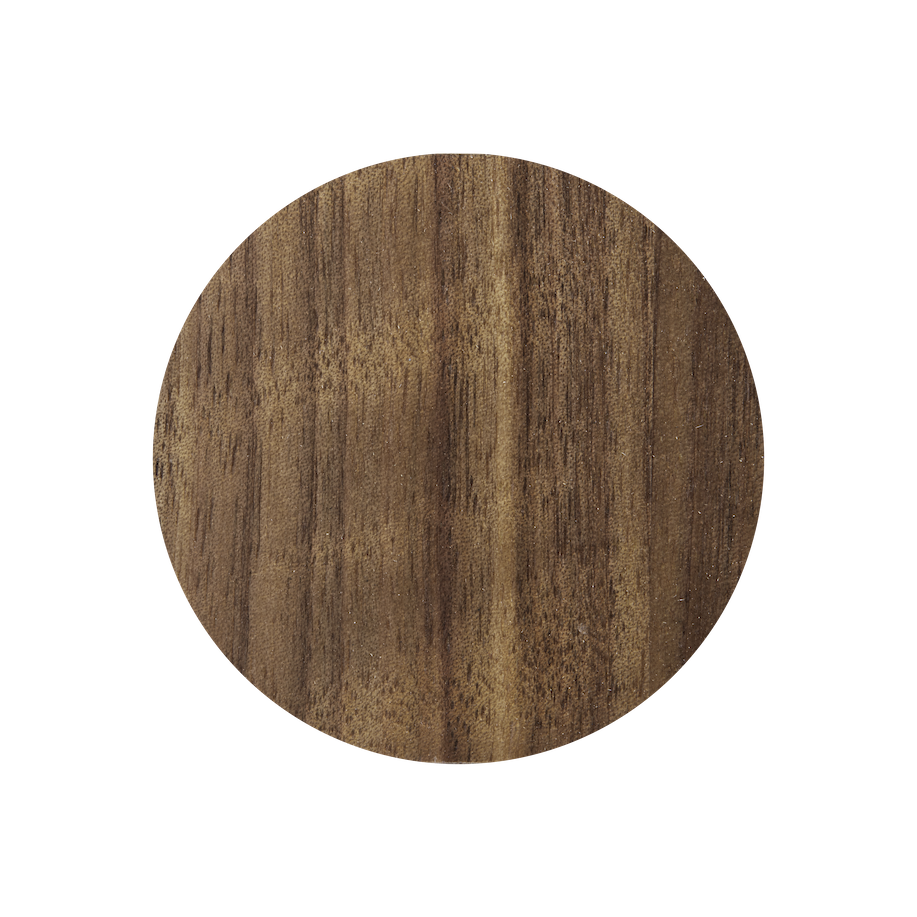 a round wooden table top on a black background
