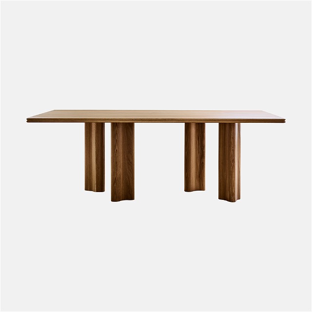 a wooden table with two columns on top of it