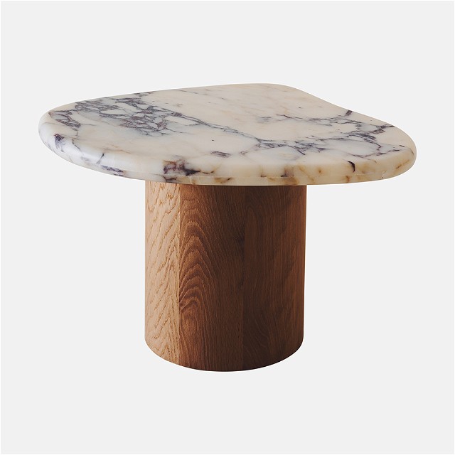 a white marble table with a wooden base