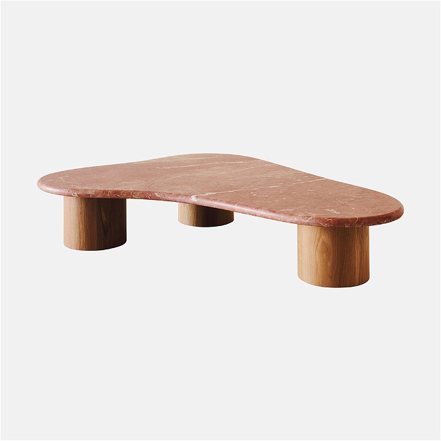 a skateboard sitting on top of a wooden table