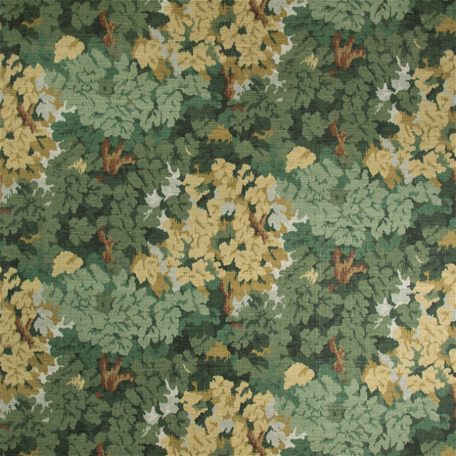 a green, yellow and brown floral pattern on fabric