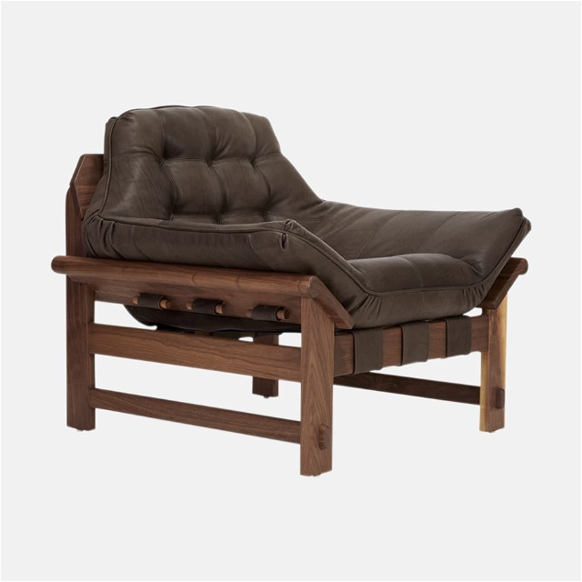 a brown leather chaise lounge chair with a wooden frame