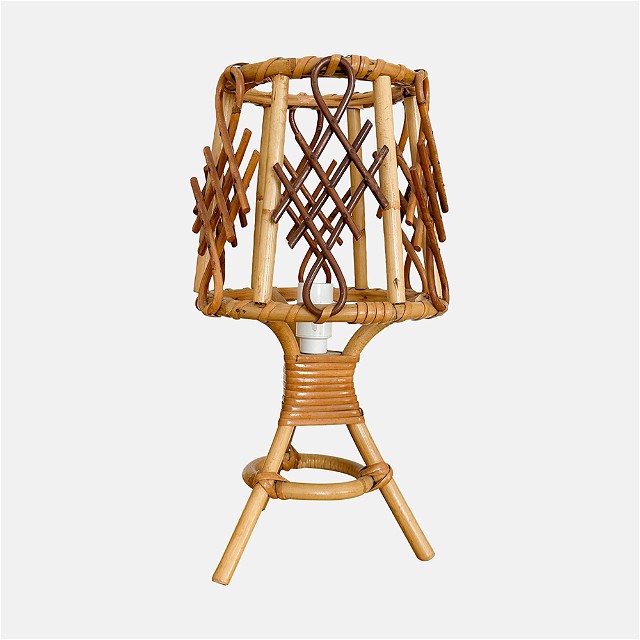 a chair made out of bamboo and wicker
