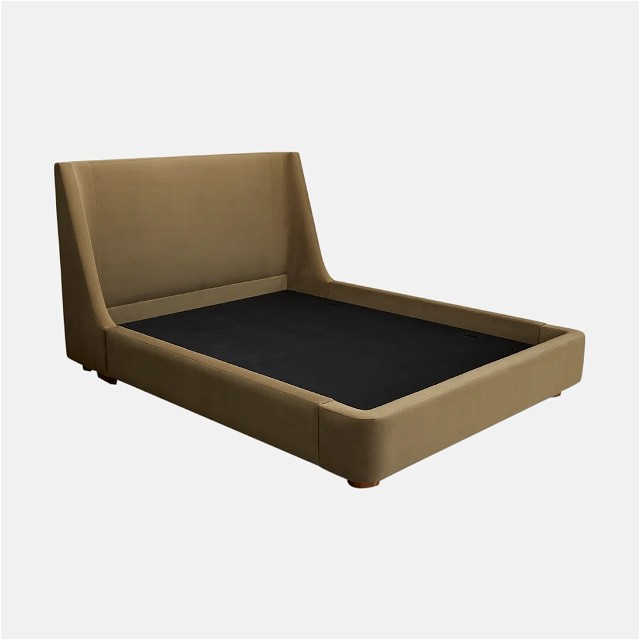 a bed with a black mattress on top of it