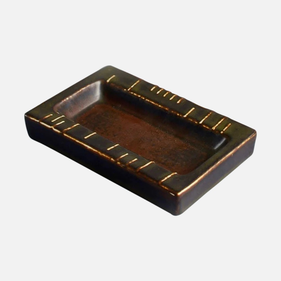 a brown tray with a brown stripe on it