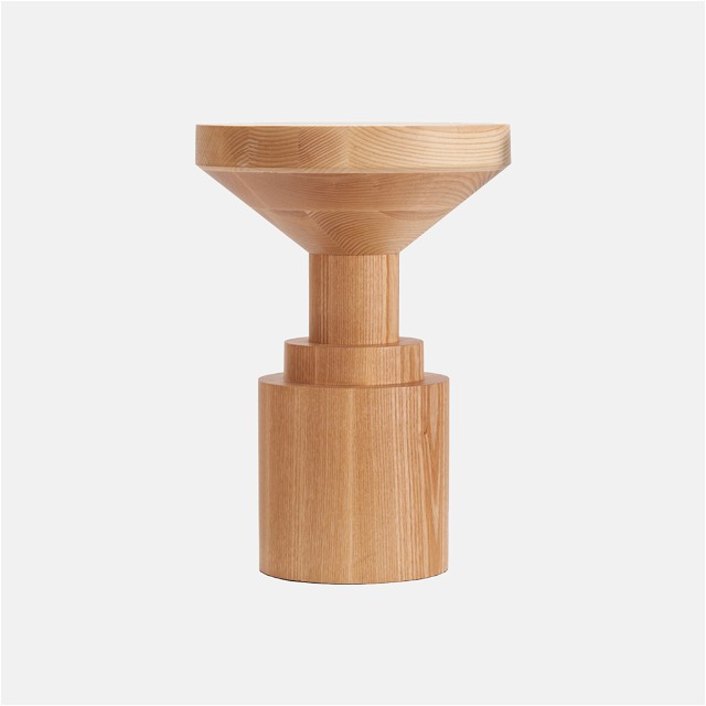 a wooden object on a white background