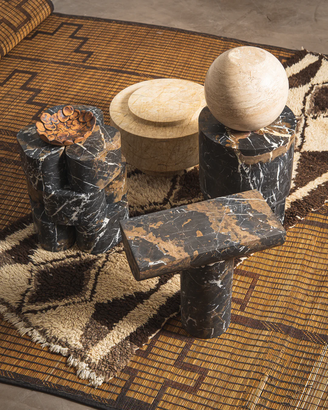 a group of black and white objects sitting on top of a rug