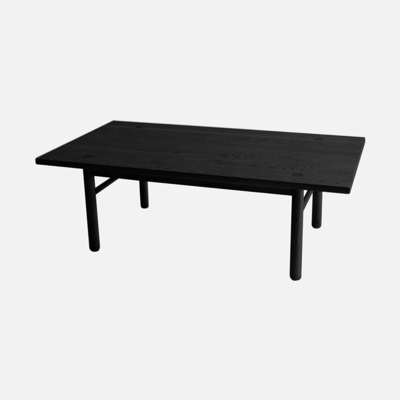 a black table sitting on top of a white floor