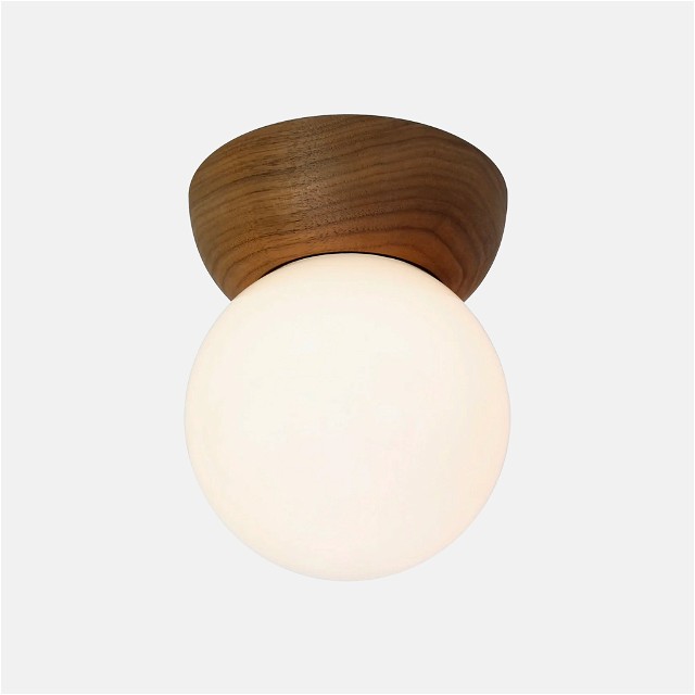 a wooden ceiling light with a white ball