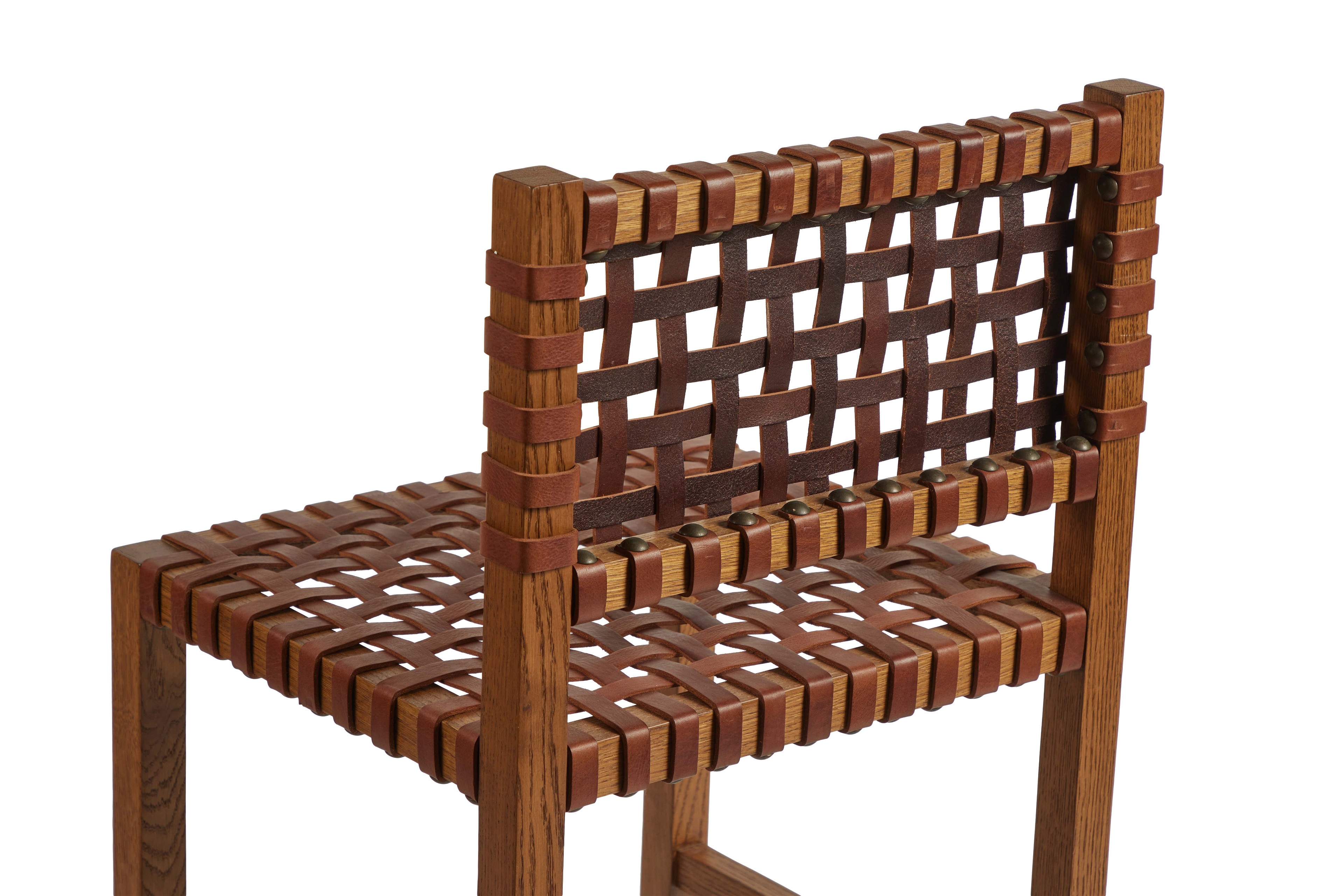 a wooden chair made out of strips of wood