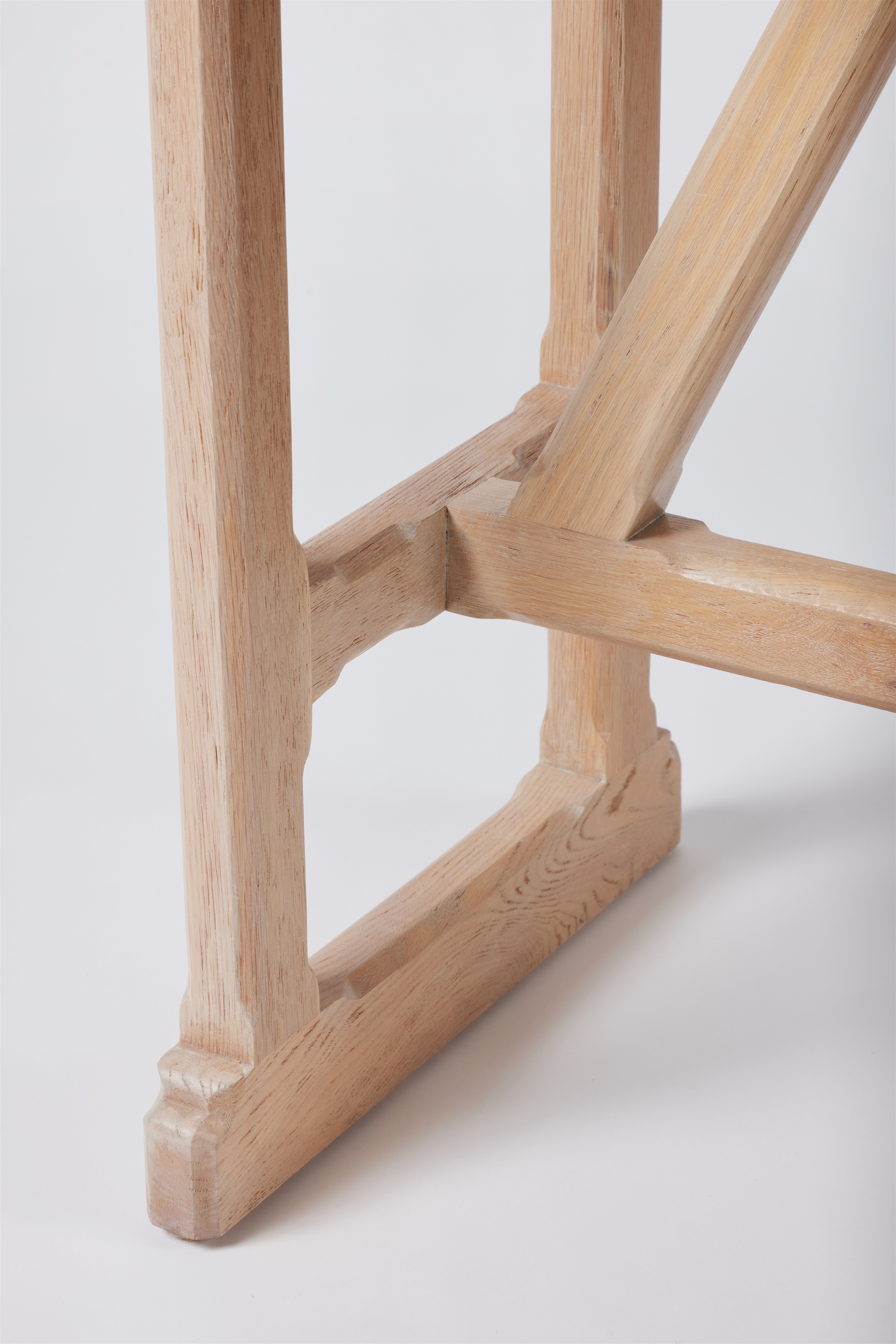 a close up of a wooden structure on a white background