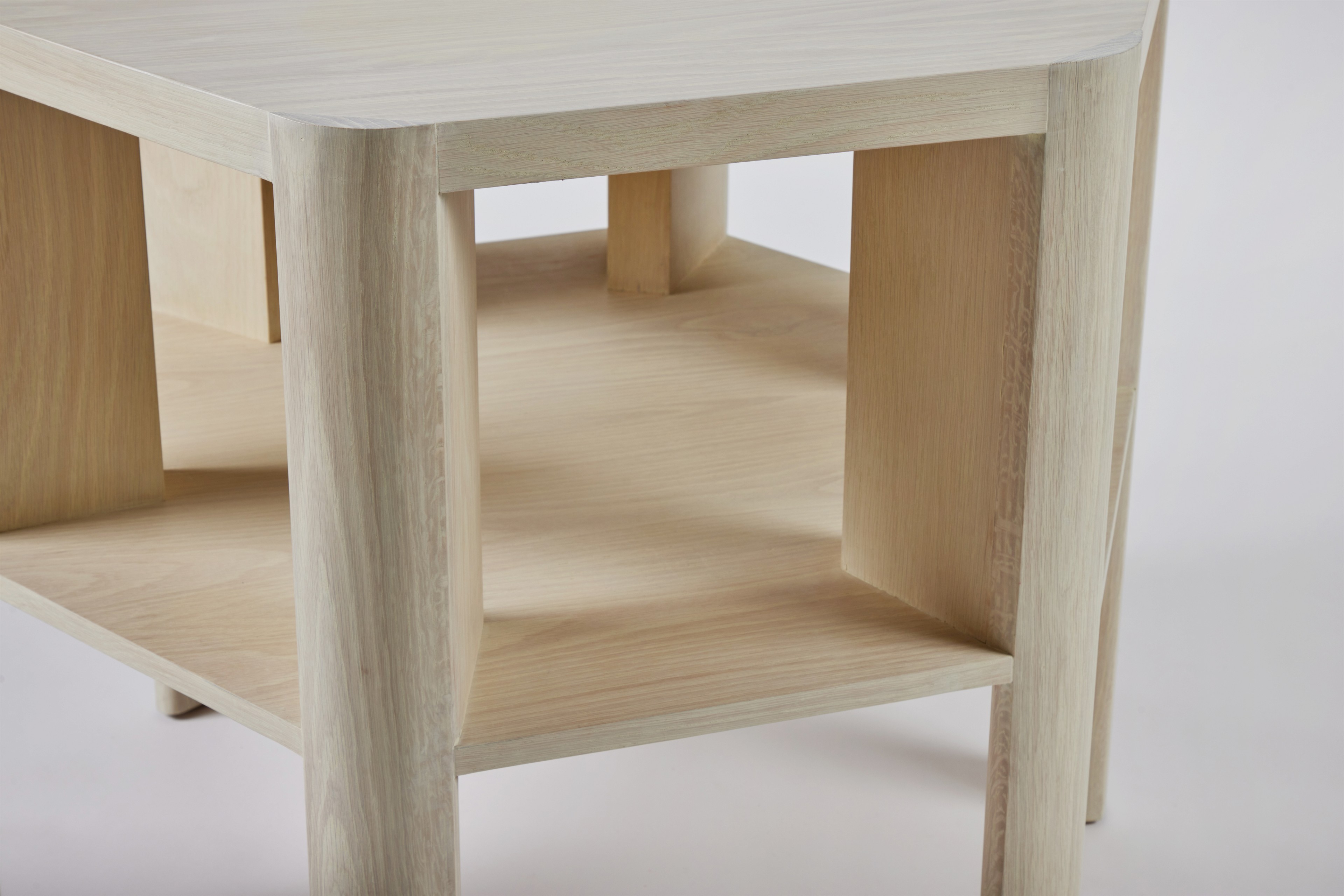 a close up of a small wooden table