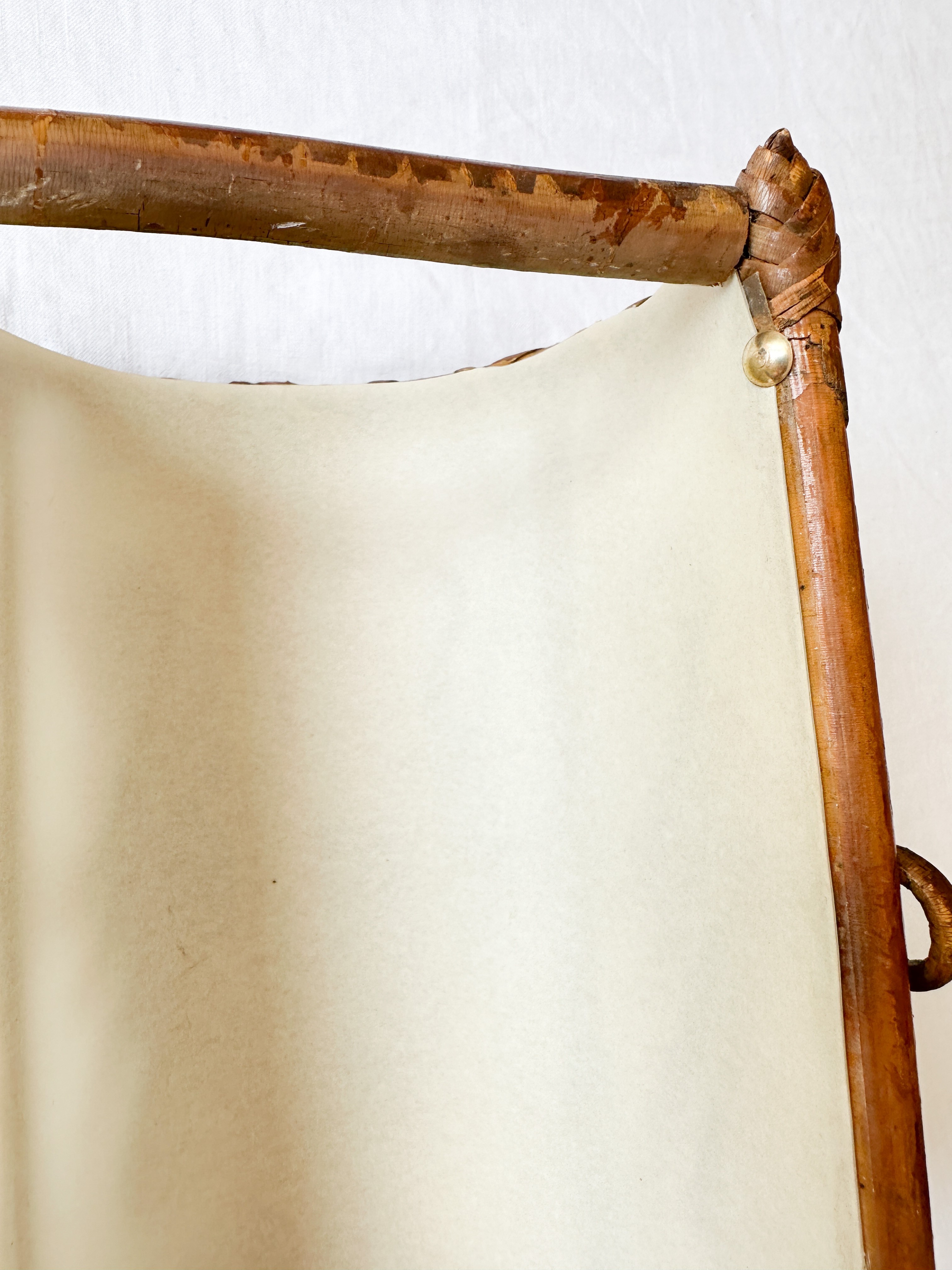 a close up of a wooden chair with a white background