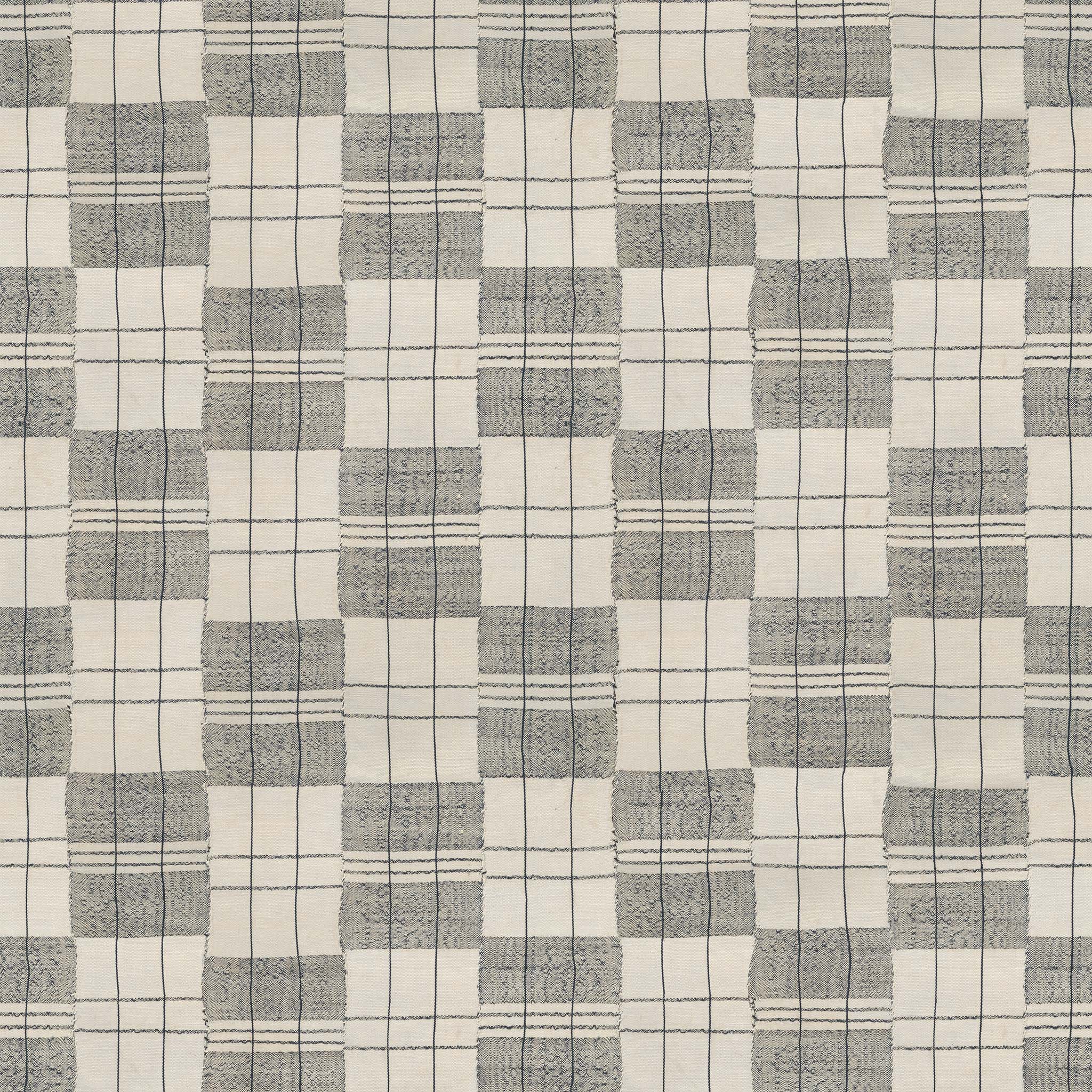 a gray and white checkerboard pattern on fabric
