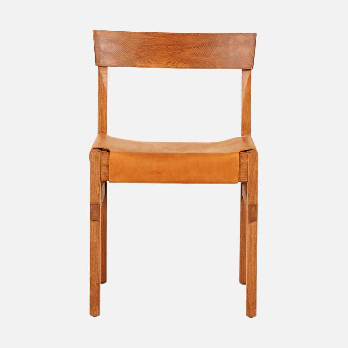 a wooden chair against a white background