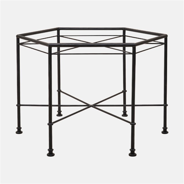 a black metal table with a glass top