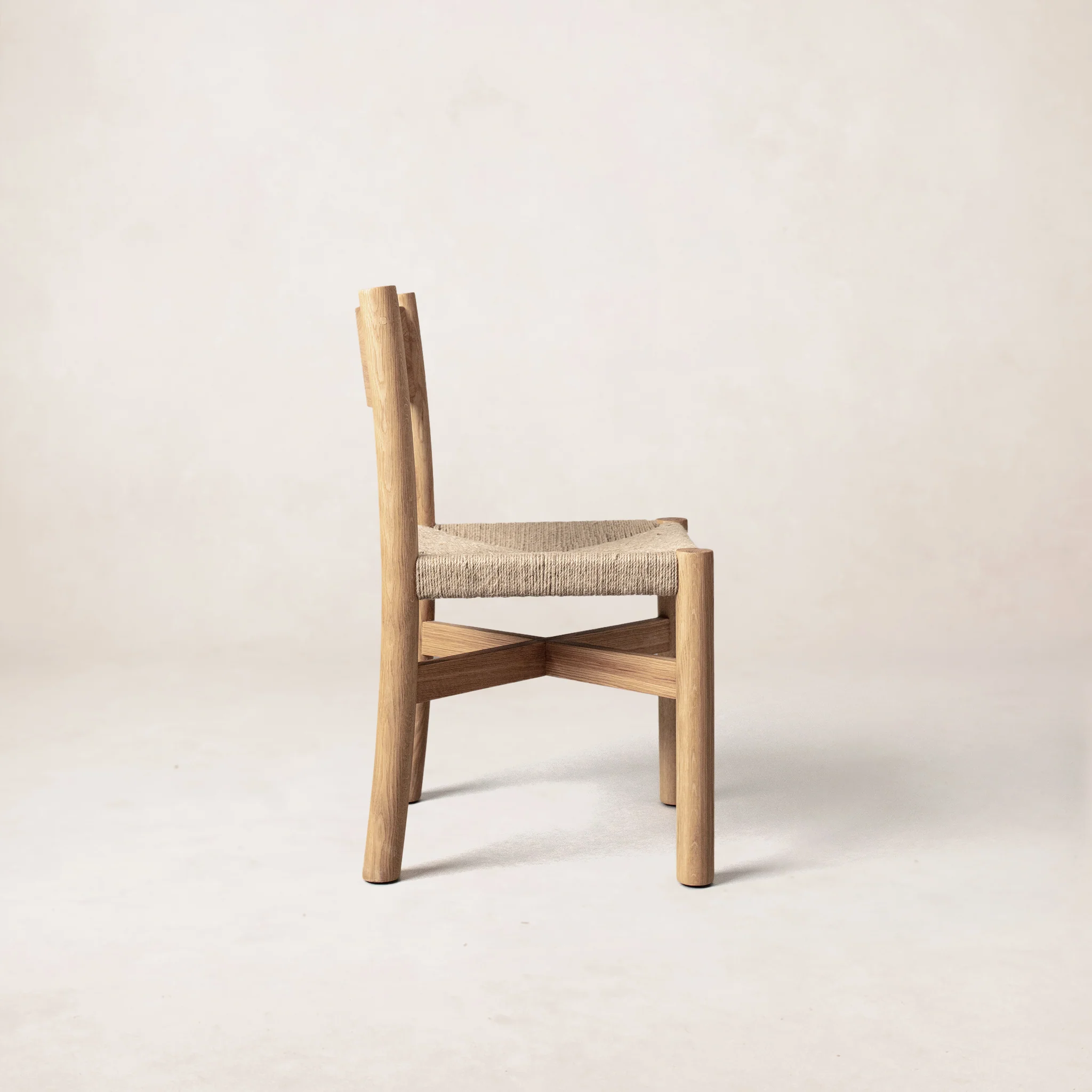 a wooden chair with a seat made of wood