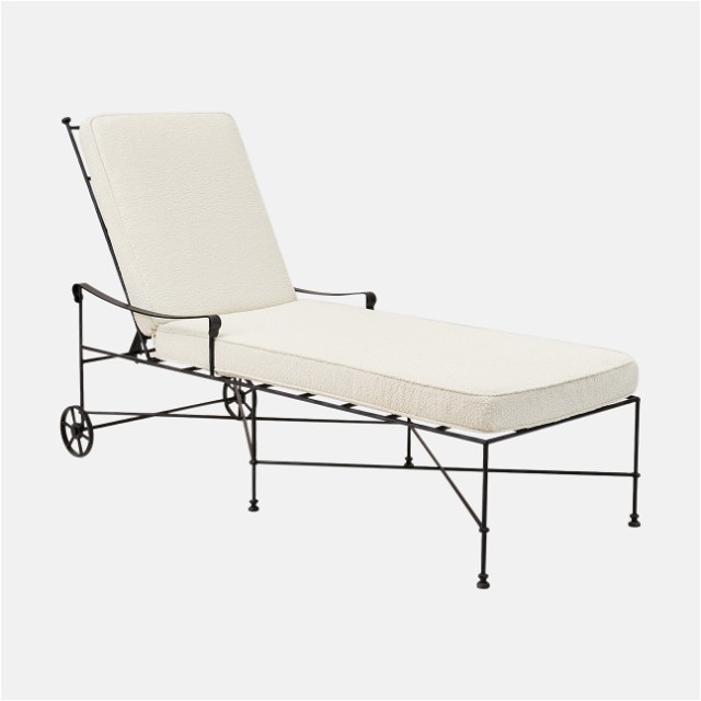 a black and white chaise lounge chair with wheels