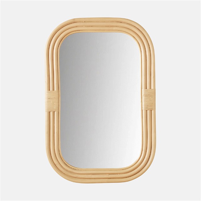 a mirror that is made out of bamboo