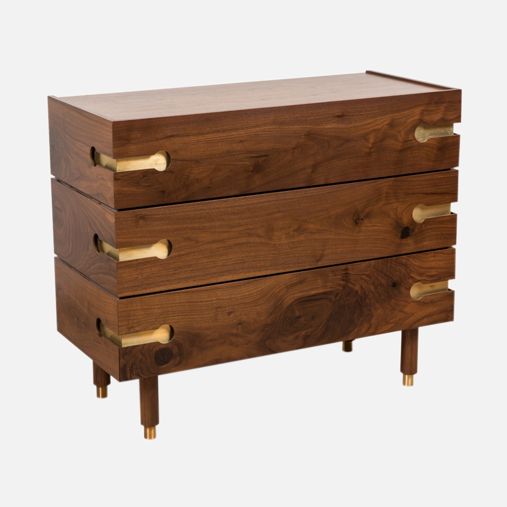 a wooden chest of drawers with brass handles