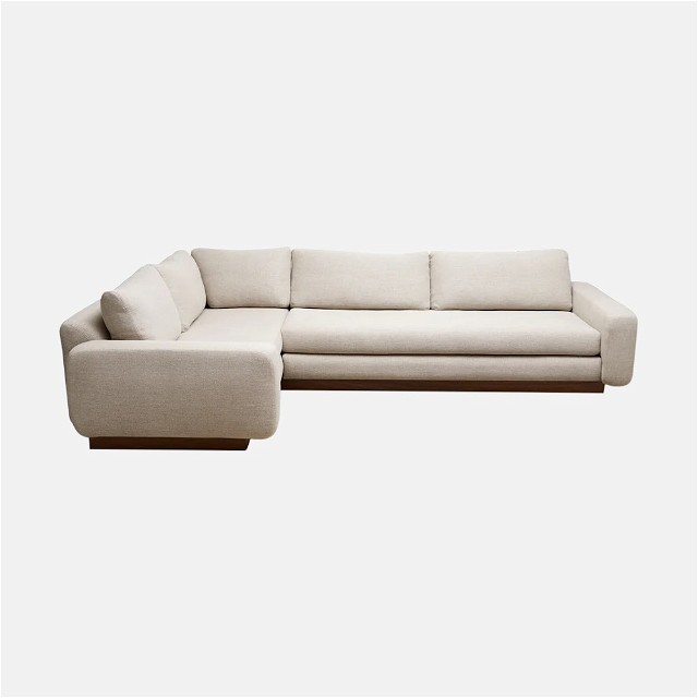 a white couch and ottoman on a white background