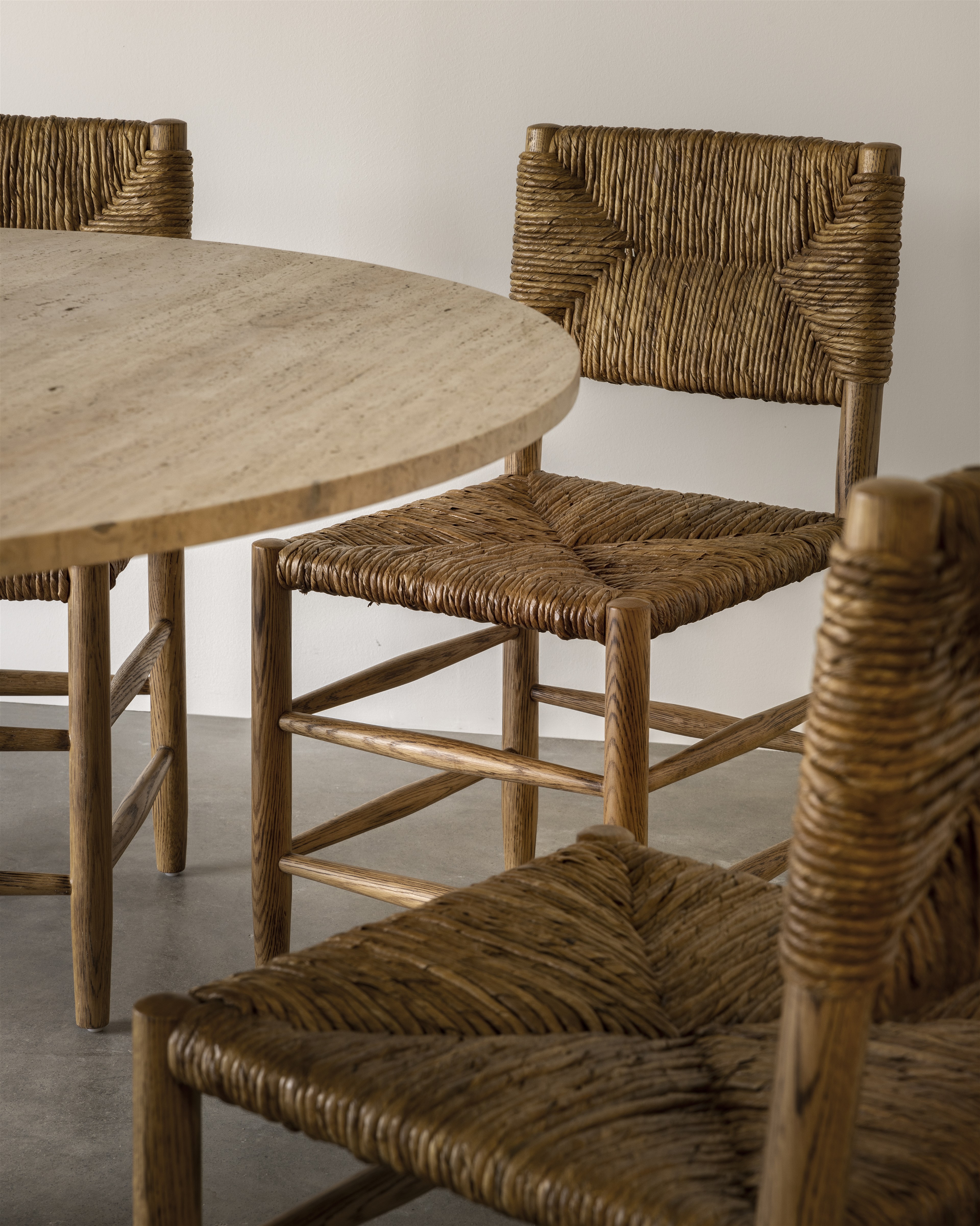 a table and chairs made of wood and wicker