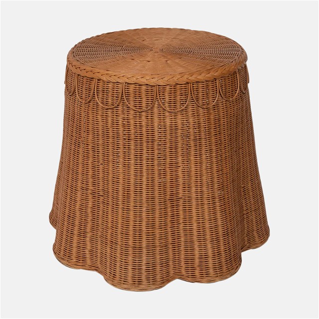 a wicker stool with a round top