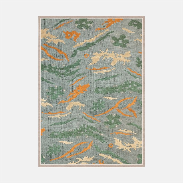 a rug with an orange and green design