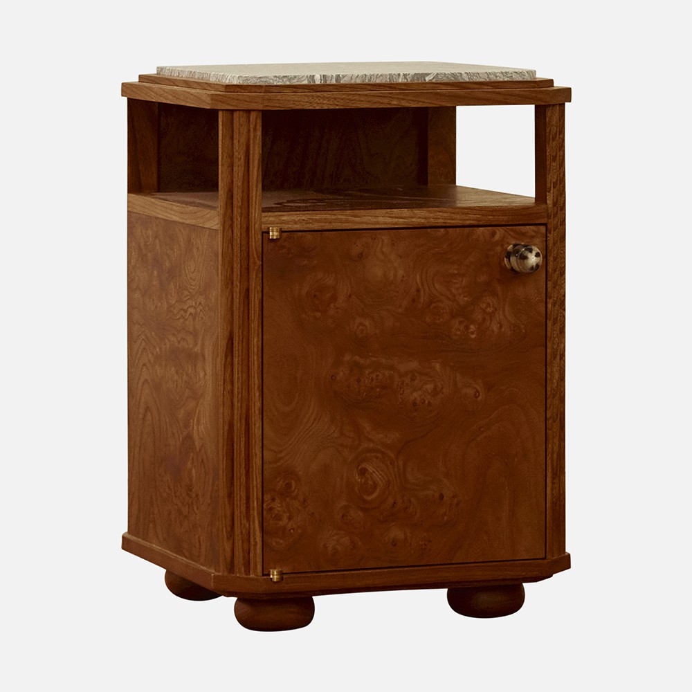 a wooden cabinet with a marble top on wheels