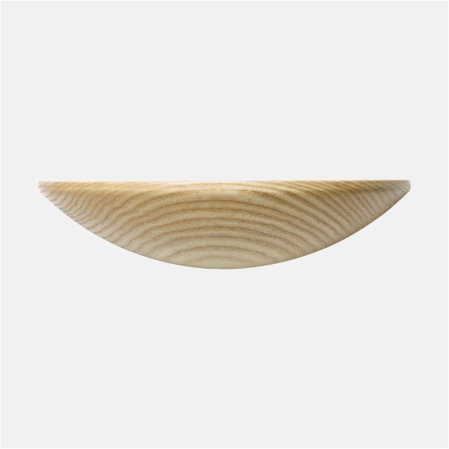 a wooden object on a white background