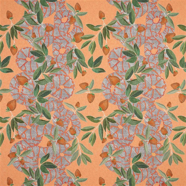 an orange background with a flower and leaves pattern
