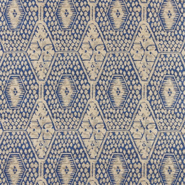 a blue and white rug with a pattern on it
