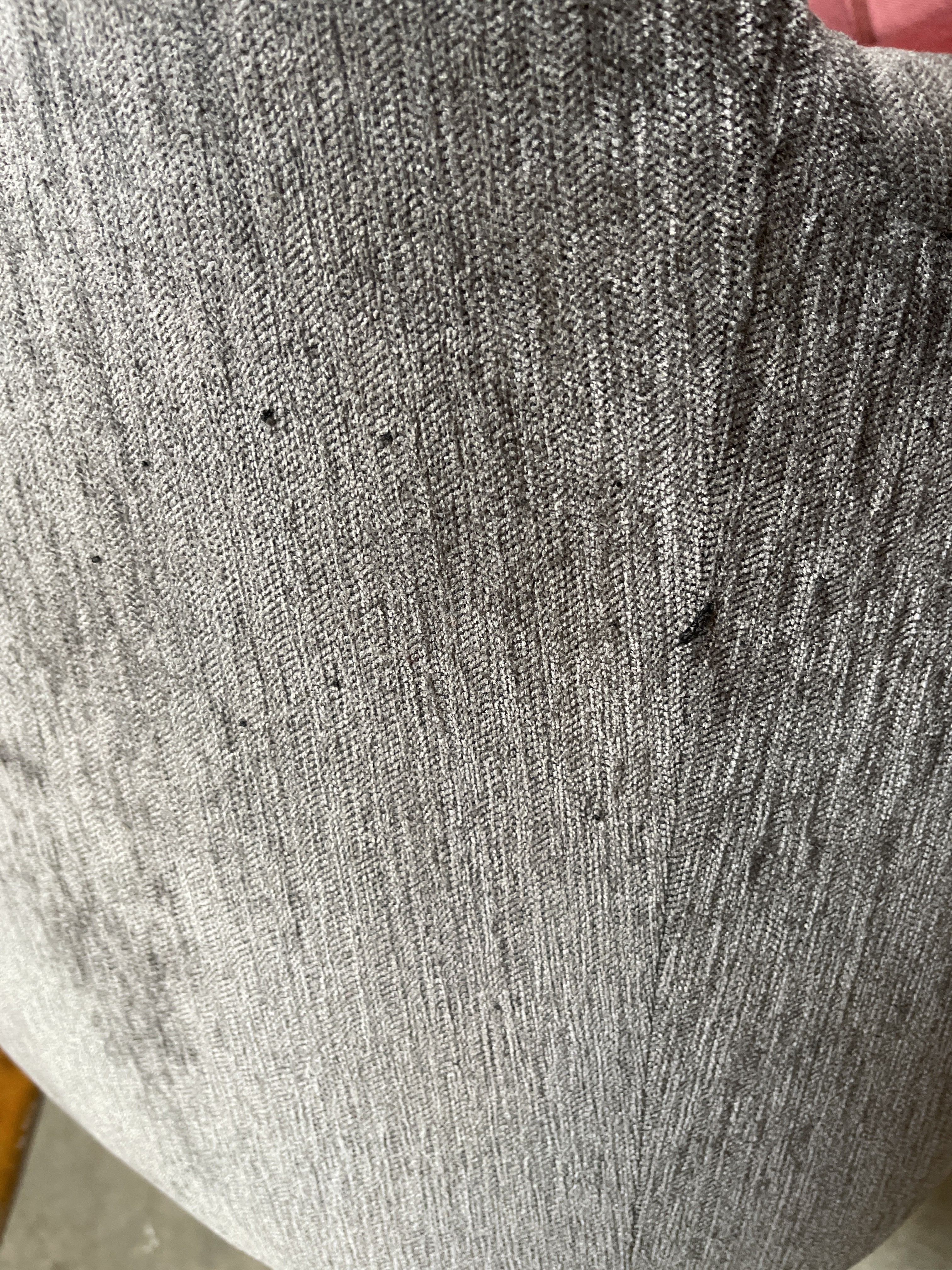 a close up of a person's leg with a piece of clothing on it