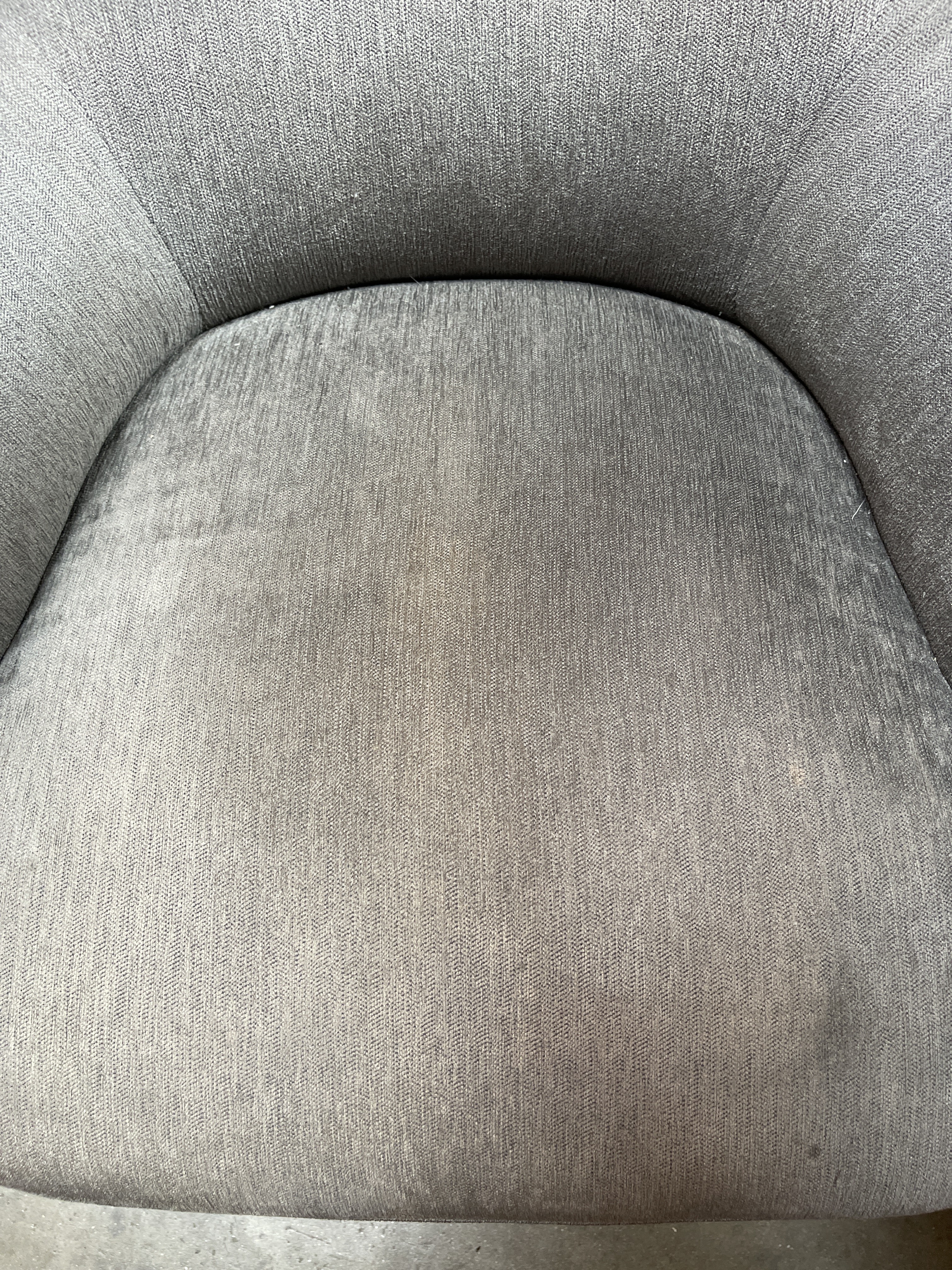 a close up of a chair with a black and white background