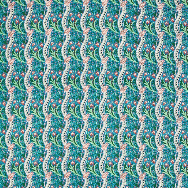 a blue and green pattern with flowers on it