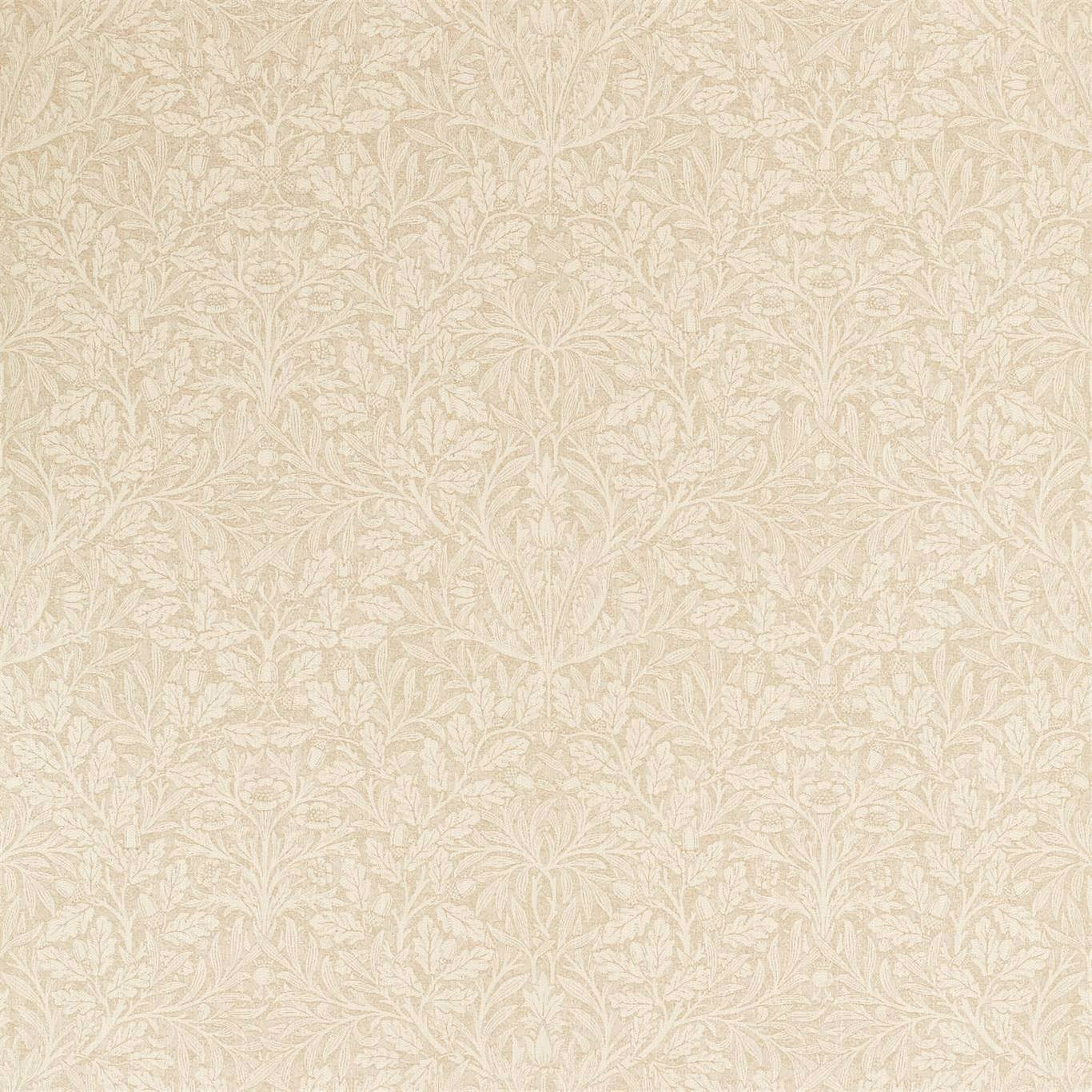 a white rug with a leaf pattern on it