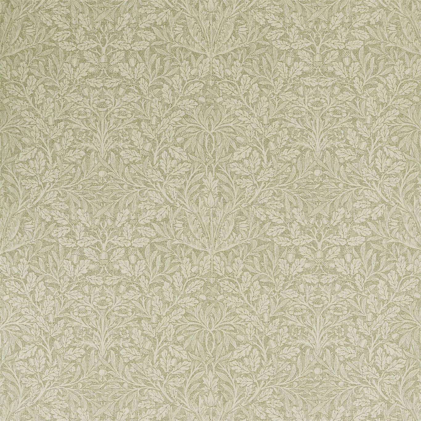 a beige rug with a leaf pattern on it
