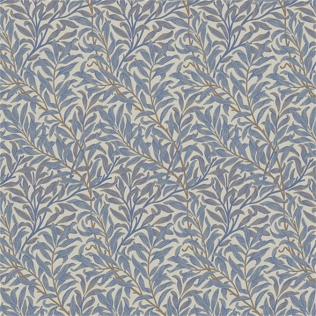 a blue and white wallpaper with leaves on it