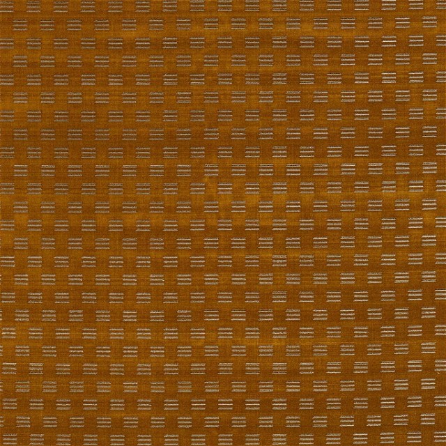 a close up of a brown fabric with white dots